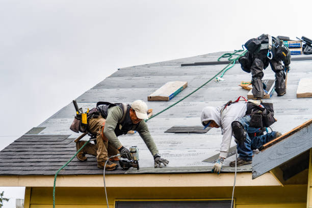 Professional Emergency Roof Repair technician working in Fuquay-Varina, NC